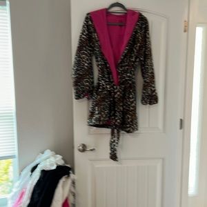 Fleece Robe by betsy Johnson.Animal print with pink color on the inside